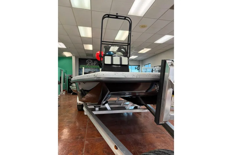 Slide: The Image of Control panel of 2026 Freedom Boats 19 PATRIOT with steering and switches. - 14