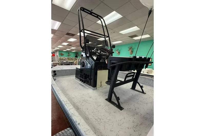 Slide: The Image of 2026 Freedom Boats 19 PATRIOT with Suzuki engine at dealership. - 3