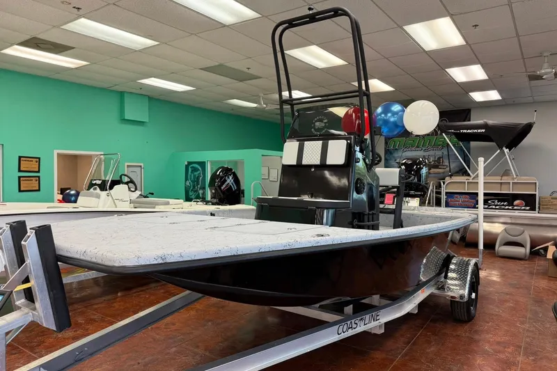 Slide: The Image of 2026 Freedom Boats 19 PATRIOT deck with dual storage hatches, marbled finish. - 4