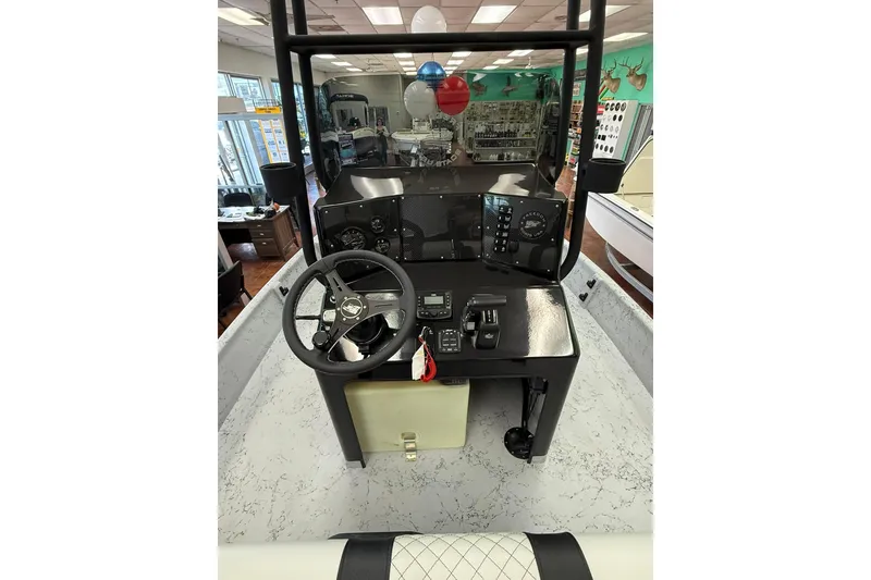 Slide: The Image of 2026 Freedom Boats 19 PATRIOT, rear view, showcasing motor and "No Wood No Rot" feature. - 9