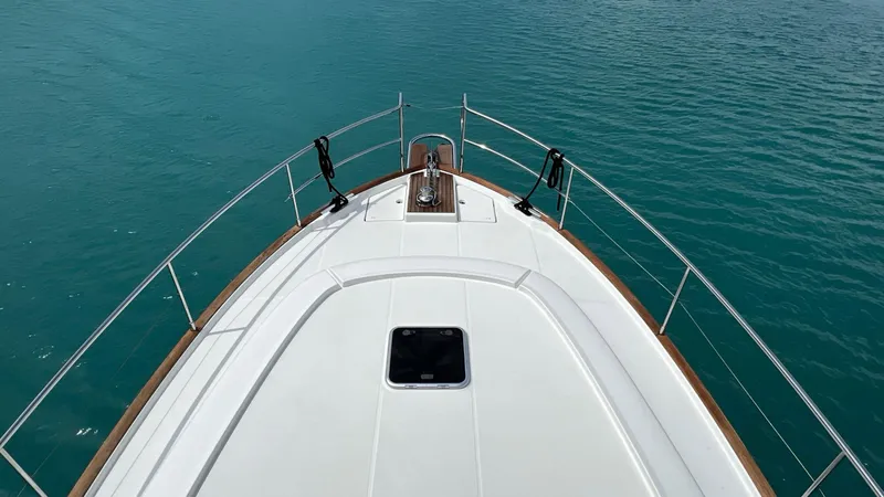 Slide: The Image of Beneteau Swift Trawler 44, 2020 model, featuring a spacious deck with ocean view. - 24