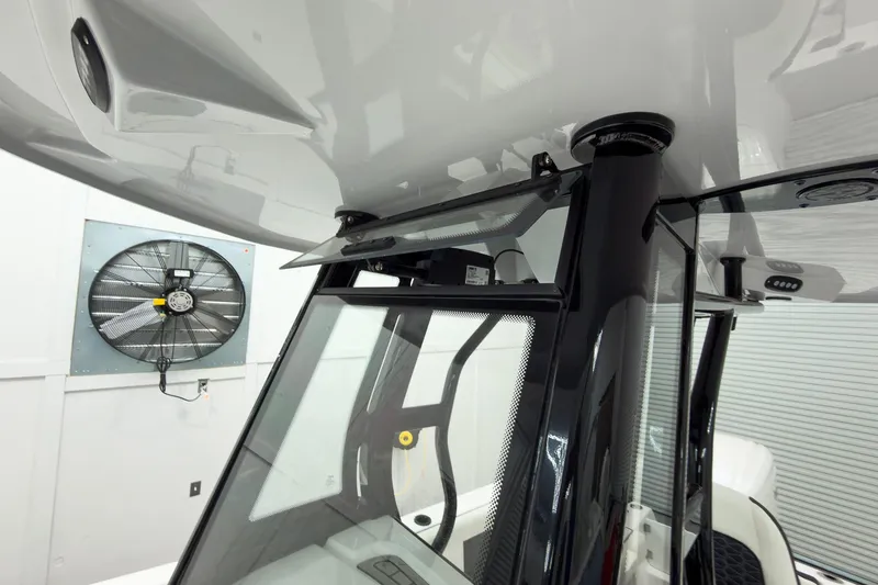 Slide: The Image of 2026 Tidewater 232 CC Adventure boat interior with modern design and ventilation system. - 33