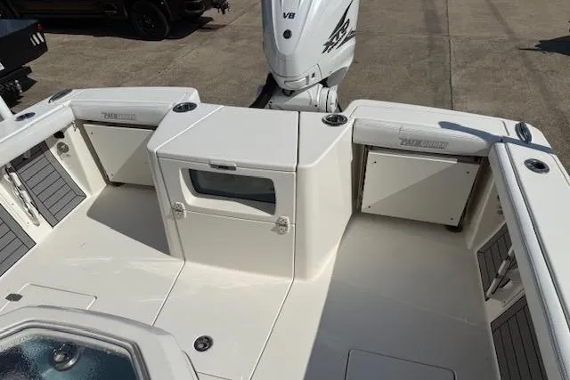 Slide: The Image of 2021 Pathfinder 2700 Open boat deck with storage compartments and seating area. - 10