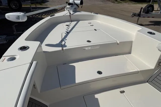 Slide: The Image of Engine compartment of a 2021 Pathfinder 2700 Open boat, showing hoses and filters. - 15