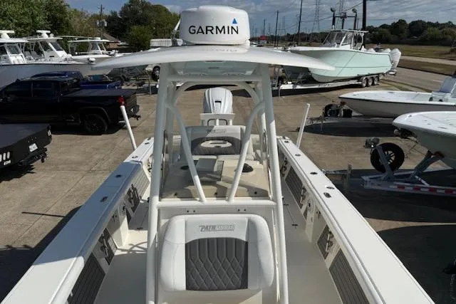 Slide: The Image of 2021 Pathfinder 2700 Open boat interior with cushioned seating and storage. - 18