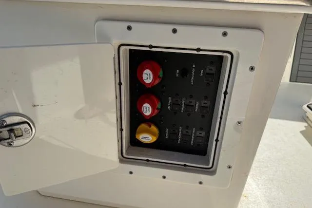 Slide: The Image of 2021 Pathfinder 2700 Open boat with Garmin radar, docked among other boats. - 19