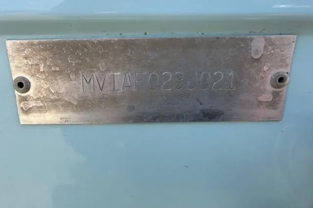 Slide: The Image of 2021 Pathfinder 2700 Open boat transom and motor detail on trailer. - 23