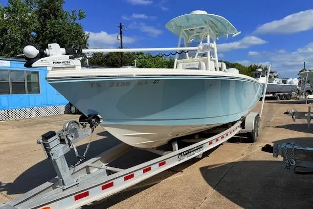Slide: The Image of 2021 Pathfinder 2700 Open boat on trailer under clear blue sky. - 3