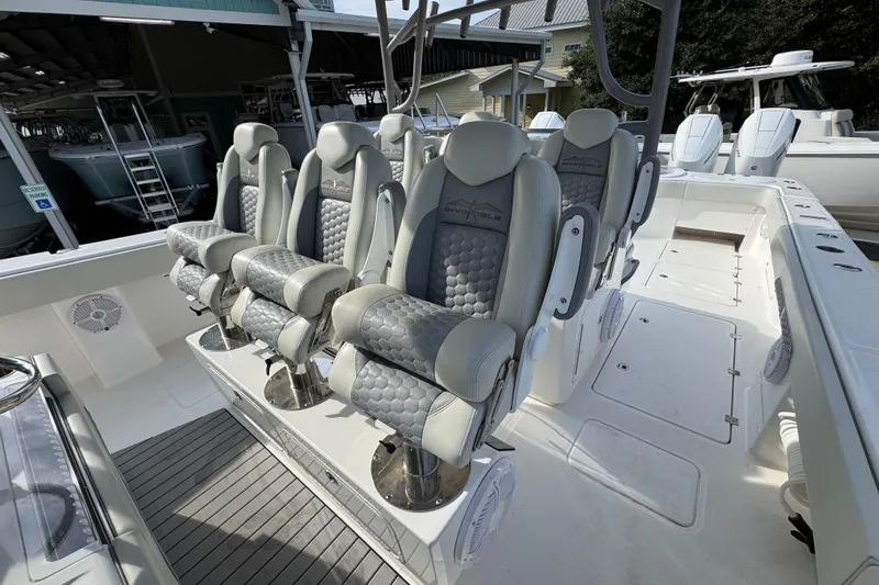 Slide: The Image of 2023 Invincible 46 Catamaran interior with luxurious seating and modern design. - 29
