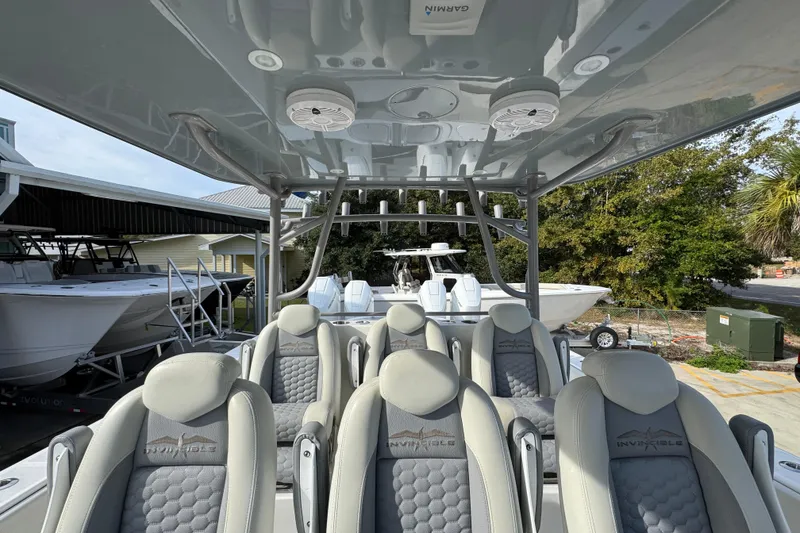 Slide: The Image of 2023 Invincible 46 Catamaran interior with luxurious seating and modern design. - 31