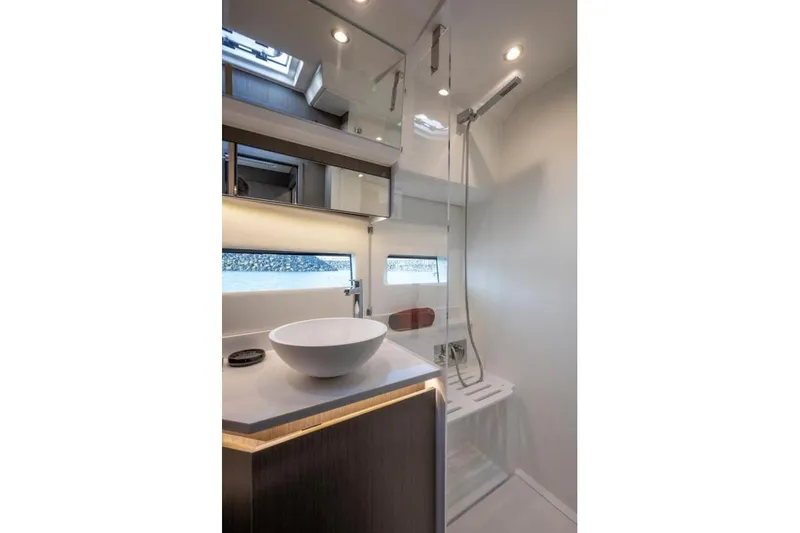 Slide: The Image of Modern bathroom interior of 2026 Jeanneau NC 1295 Coupe yacht, featuring sleek design and fixtures. - 31