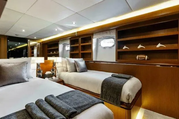 Slide: The Image of Luxurious Tecnomar 35 Nadara 2006 yacht bedroom with twin beds and elegant decor. - 22