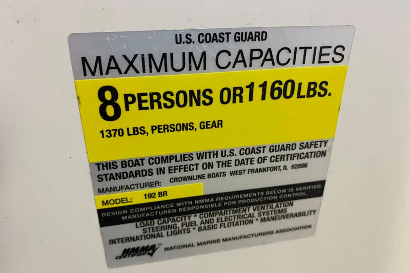 Slide: The Image of U.S. Coast Guard capacity label for 2004 Crownline 192 BR, 8 persons or 1160 lbs. - 18