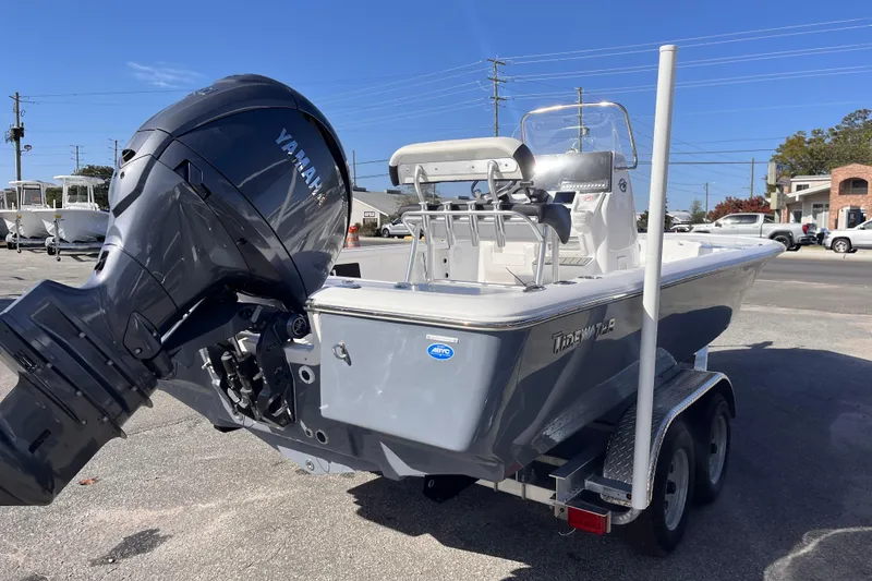 Slide: The Image of 2026 Tidewater 2110 Bay Max boat with Yamaha engine on trailer. - 4