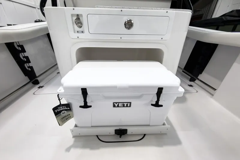 Slide: The Image of 2026 Tidewater 272 CC Adventure boat with Yeti Tundra 45 cooler on deck. - 31