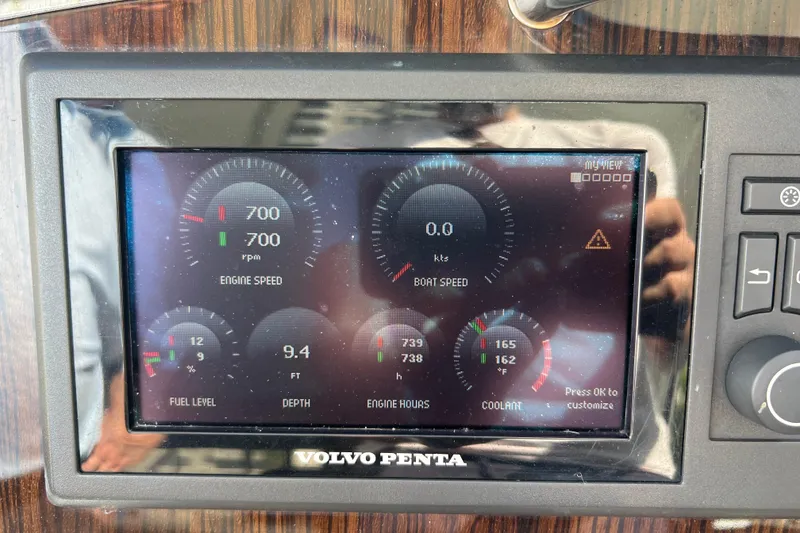 Slide: The Image of Volvo Penta display on 2013 Cruisers Yachts 380 Express showing engine and boat metrics. - 16