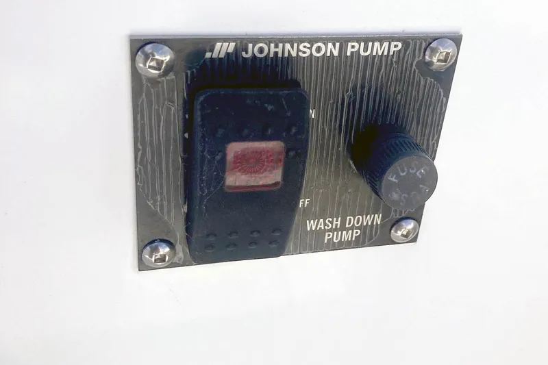 Slide: The Image of Johnson Pump wash down control on 2021 Ranger Tugs R-25 boat. - 34