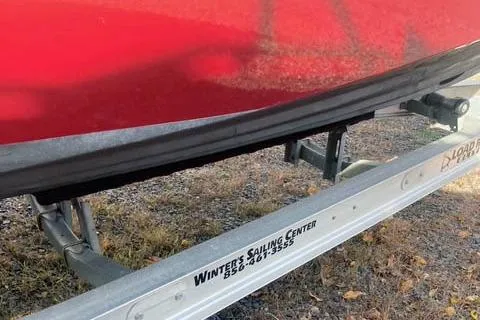 Slide: The Image of Red 2021 Ranger Tugs R-25 boat on trailer from Winter Sailing Center. - 8