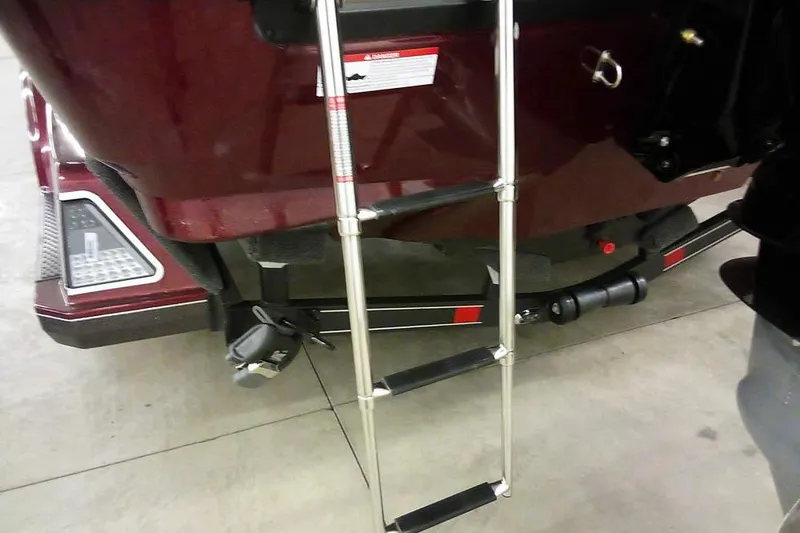 Slide: The Image of 2026 Ranger 1850MS Reata boat with a metal boarding ladder. - 10