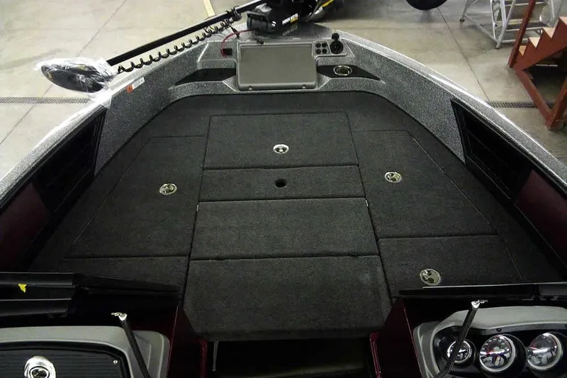 Slide: The Image of 2026 Ranger 1850MS Reata boat interior with spacious deck and modern controls. - 14