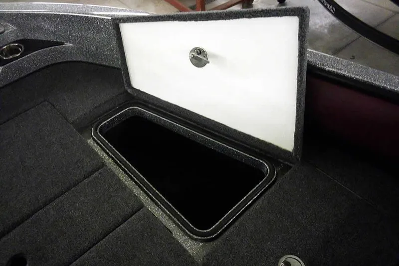 Slide: The Image of Open storage compartment in 2026 Ranger 1850MS Reata boat. - 16