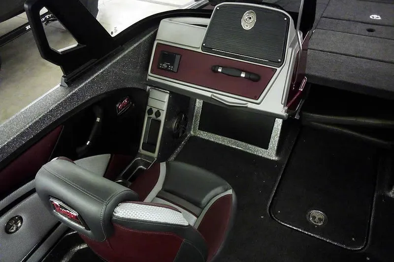Slide: The Image of 2026 Ranger 1850MS Reata boat interior with sleek dashboard and comfortable seating. - 25