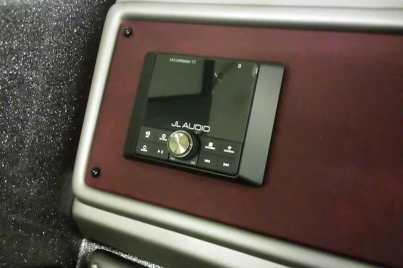 Slide: The Image of JL Audio system in 2026 Ranger 1850MS Reata boat, featuring sleek design and controls. - 27