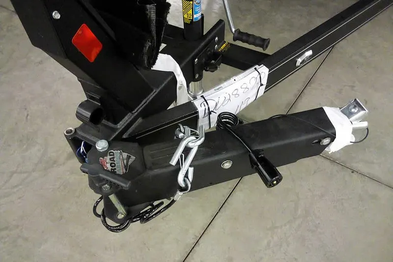 Slide: The Image of Trailer hitch of 2026 Ranger 1850MS Reata boat, featuring secure locking mechanism. - 43