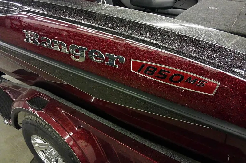 Slide: The Image of 2026 Ranger 1850MS Reata boat with metallic red finish and chrome accents. - 5