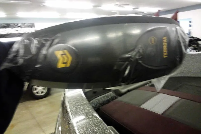 Slide: The Image of Close-up of a 2026 Ranger 1850MS Reata boat component in a showroom. - 8