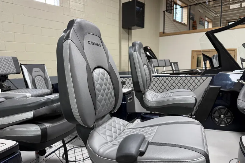 Slide: The Image of 2026 Caymas DV 22 boat interior with luxurious gray seating and modern design. - 12
