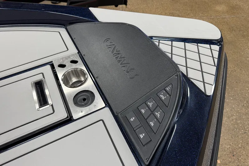Slide: The Image of 2026 Caymas DV 22 boat dashboard with control panel and cup holder. - 8