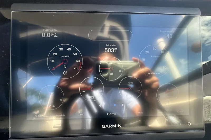 Slide: The Image of Garmin display on 2019 Sea Ray SDX 270 Outboard showing engine metrics and odometer. - 8