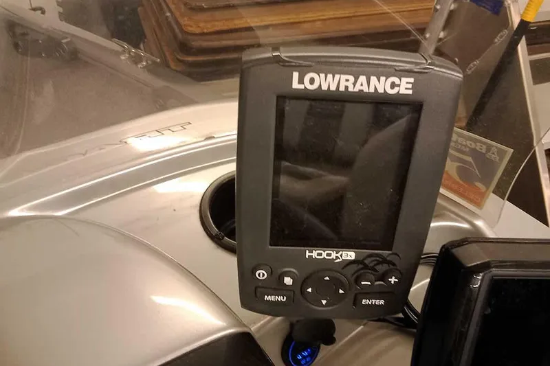 Slide: The Image of Lowrance Hook 3X fish finder on 2018 Tracker Pro Guide V-16 SC boat dashboard. - 19