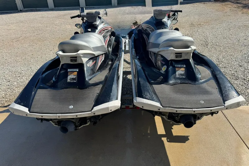 Slide: The Image of 2007 Yamaha WaveRunner VX Cruiser jet skis on a trailer, rear view. - 5
