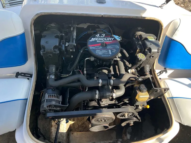 Slide: The Image of Engine of a 2005 Tahoe T18 Ski Boat with 4.3 Mercury MerCruiser. - 16