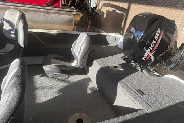 Slide: The Image of 2026 Lowe Fishing Machine 1625SC interior with Mercury outboard motor. - 10