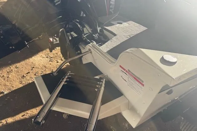 Slide: The Image of 2026 Lowe Fishing Machine 1625SC boat ladder and deck in sunlight. - 13