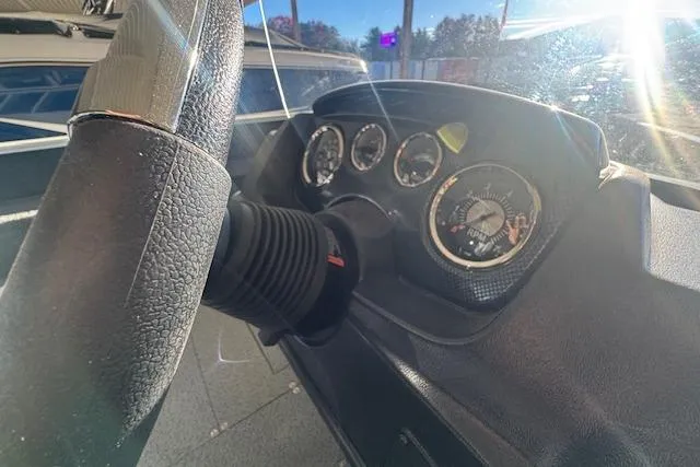 Slide: The Image of Steering wheel and dashboard of 2026 Lowe Fishing Machine 1625SC in sunlight. - 16