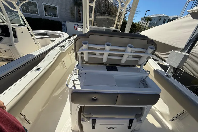 Slide: The Image of 2021 Key West 239 FS boat interior with fishing rod holders and sink station. - 20