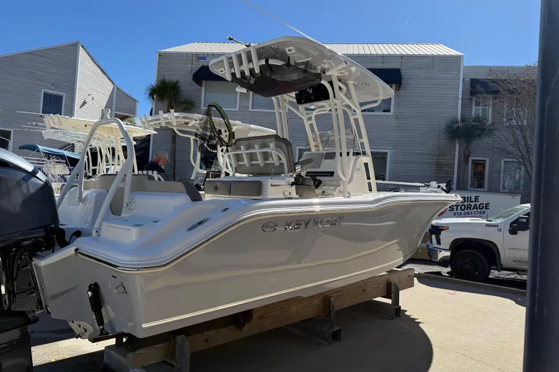 Slide: The Image of 2021 Key West 239 FS boat displayed outdoors on a sunny day. - 3