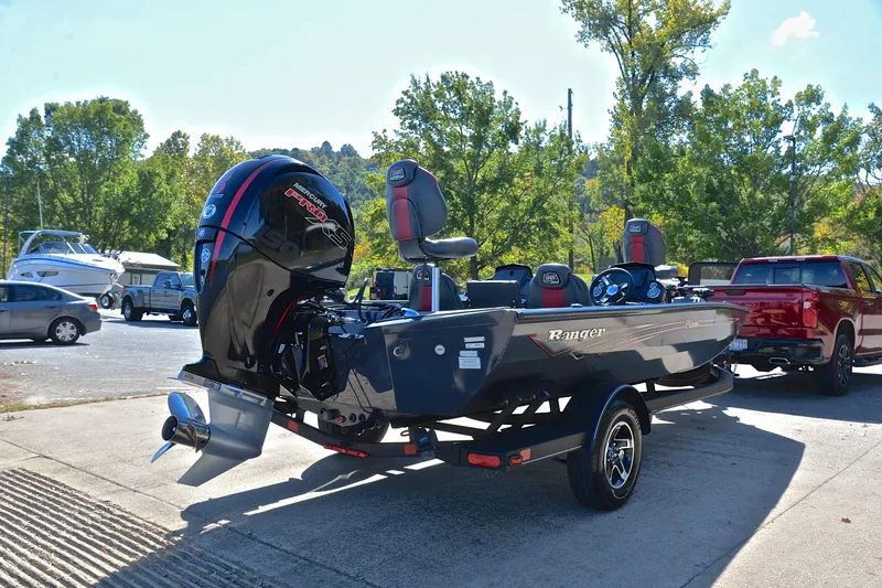 Slide: The Image of 2022 Ranger RT198P boat with Mercury Pro XS engine on trailer, parked outdoors. - 14