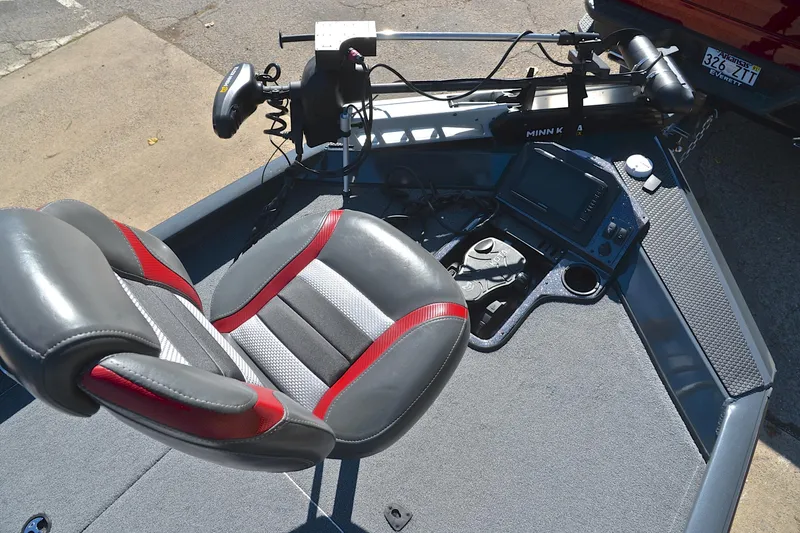 Slide: The Image of 2022 Ranger RT198P boat interior with seat, trolling motor, and control panel. - 25