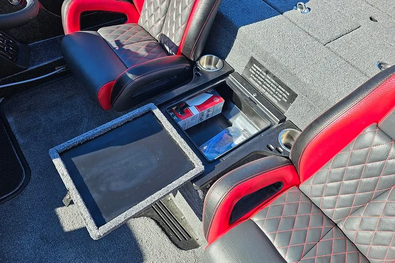 Slide: The Image of 2026 Phoenix 818 Pro interior with red and black seats, storage compartment, and cup holders. - 17