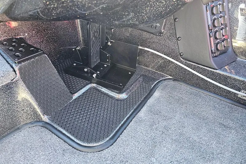 Slide: The Image of Interior of 2026 Phoenix 818 Pro boat showing foot pedal and control panel. - 19