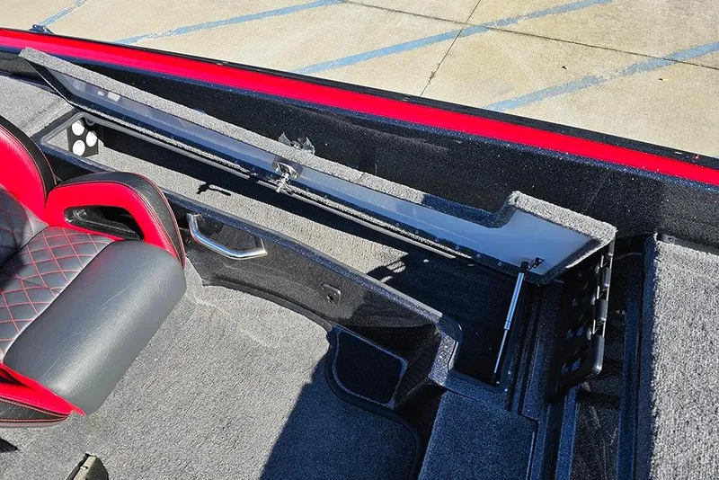 Slide: The Image of Interior of 2026 Phoenix 818 Pro boat with red and black seating and storage compartment. - 22