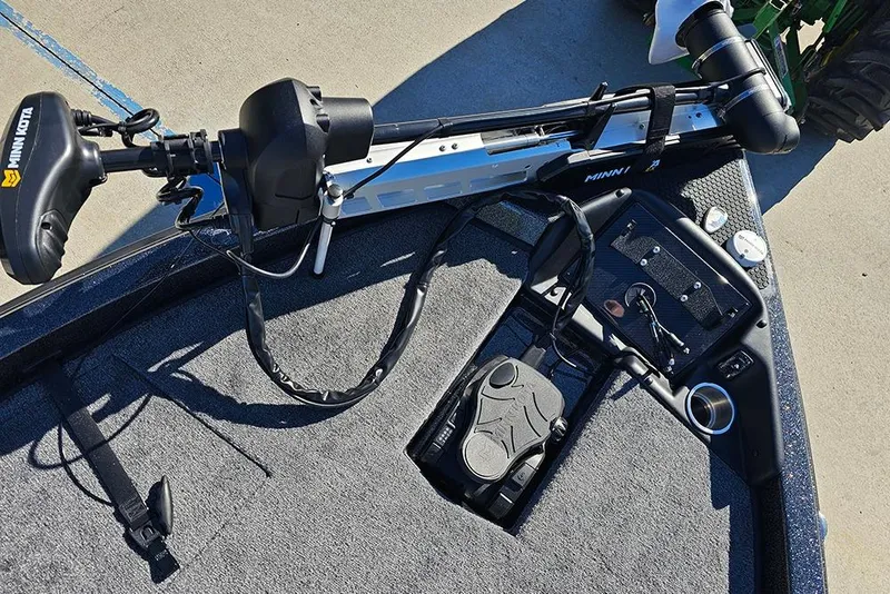 Slide: The Image of Phoenix 818 Pro 2026 boat with Minn Kota trolling motor on deck. - 28