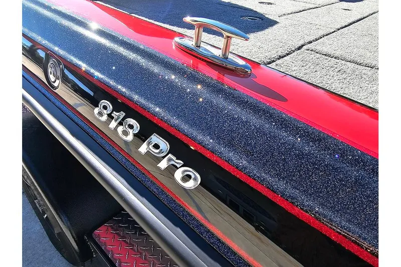 Slide: The Image of Shiny 2026 Phoenix 818 Pro boat detail with metallic finish and cleat. - 32