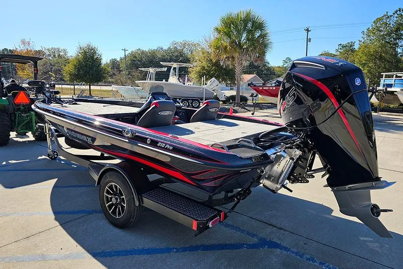 Slide: The Image of 2026 Phoenix 818 Pro boat with sleek design and powerful engine, parked outdoors. - 7