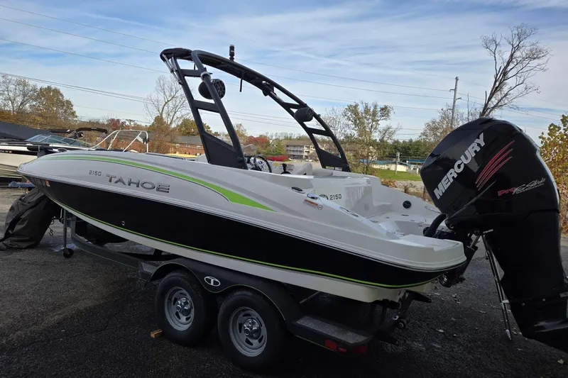 Slide: The Image of 2018 Tahoe 2150 boat with Mercury outboard engine on trailer. - 4